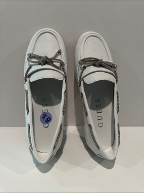 Guess White and Silver Bow Loafers with Memory Soles and Rubber Bottoms.